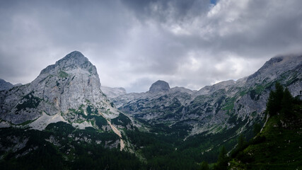 Obraz premium Impressive, pointy peaks on Triglav national park, on a moody, cloudy day with great light