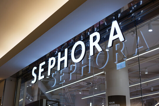 Sephora cosmetics retailer logo above the entrance to the store in central Dusseldorf