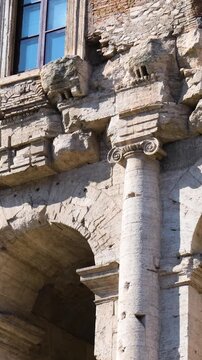 weathered stone arches ionic columns characterize theatre marcellus fa&ccedil;ade topped by brick renaissance era structure tall windows patched masonry rome italy of 