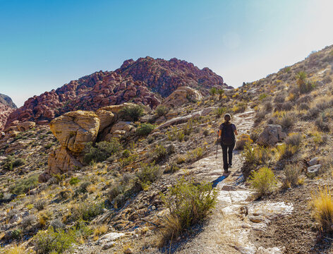 Female Hiker Near The Summit of Pink Goblin Pass, Kraft Mountain Loop Trail, Red Rock Canyon Nature Conservation Area, Nevada, USA
