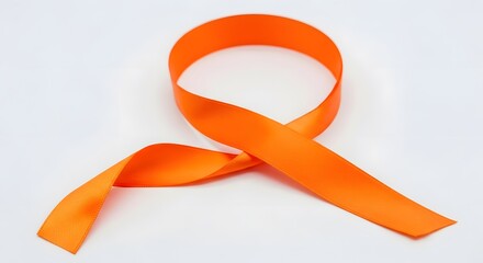 Single, vibrant orange ribbon loop against a plain white backdrop, highlighting its sleek texture
