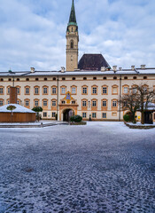 Fototapeta premium Vertical View of St. Peter's Abbey Courtyard and Franciscan Church Tower