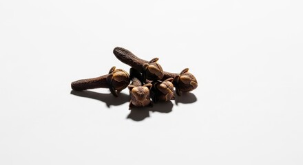 Obraz premium Dried Whole Cloves Isolated on Pure White Background