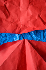 red and blue crumpled paper background
