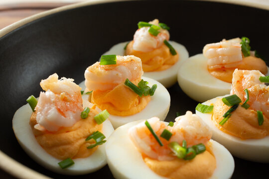 A closeup view of shrimp deviled eggs.