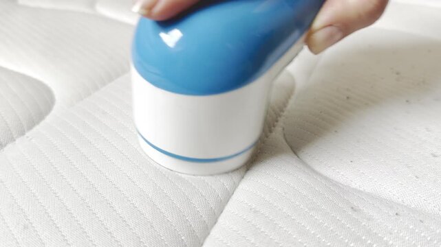 fabric lint removal process close up view