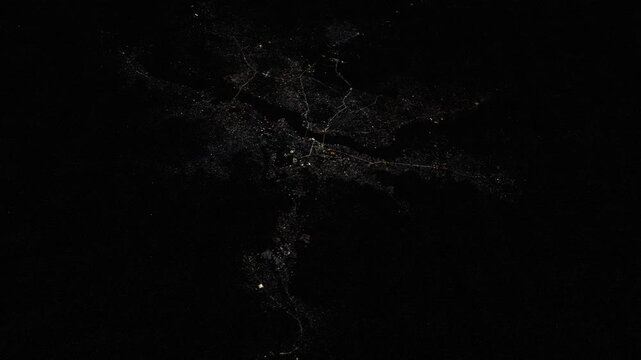 Bamako night city lights and Niger River, satellite view of urban Africa animation based on NASA imagery