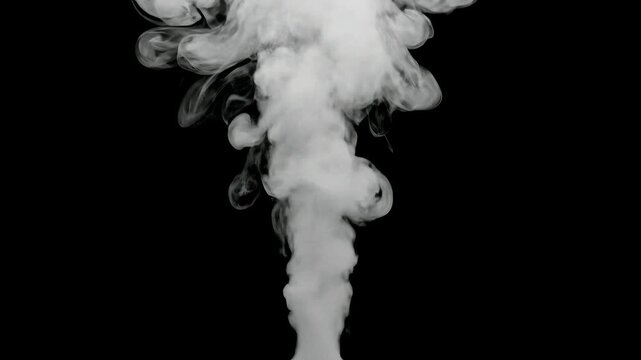 Dense white smoke plume rising vertically against a stark black background, creating a dramatic contrast.