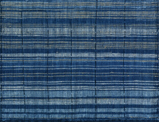 余った糸を利用した「残糸織り」の縞、古い時代の藍染め生地