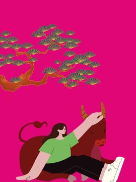 A woman is sitting under a tree with her buffalo.