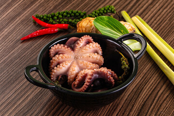 Gourmet Boiled octopus in the bowl © Andrei Starostin