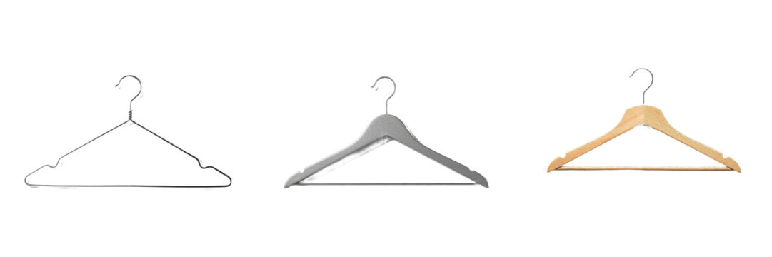 Set of different clothes hangers, collection of metal wire, grey plastic and natural wooden coat hangers isolated on white background