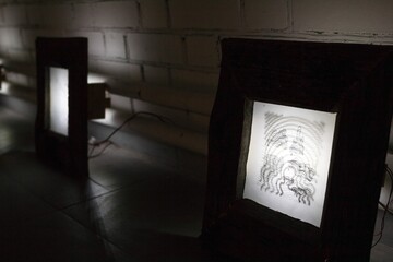 Illuminated Art Frames. A Captivating Display of Imaginative Drawings and Creative Visuals.