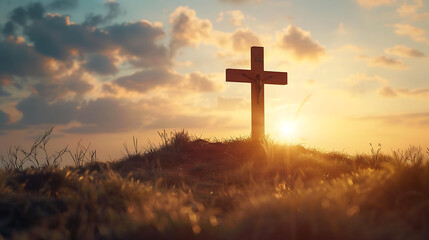 serene sunset over wooden cross silhouette on grassy hill, symbolizing hope and faith