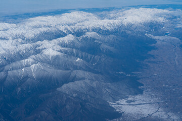 Fototapeta premium 上空から見た飛騨山脈と松本盆地