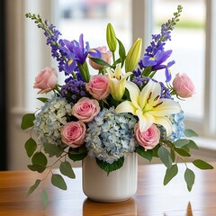 Elegant floral arrangement featuring roses, lilies, irises and hydrangeas