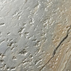 Intricate details of a stone surface with textured and glistening elements