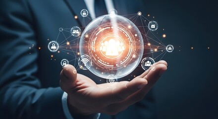 Fototapeta premium Businessman holding a glowing orb with interconnected icons