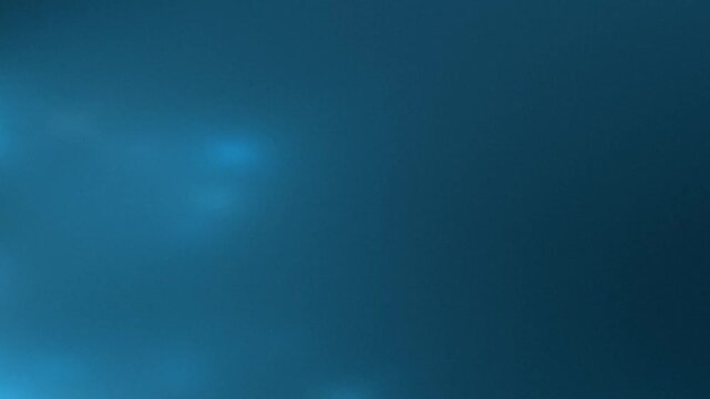 Entering a Calm Oceanic Scene with Soft Blue Light and Blurred Motion