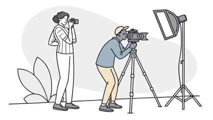 Two photographers capturing moments in a studio setting.