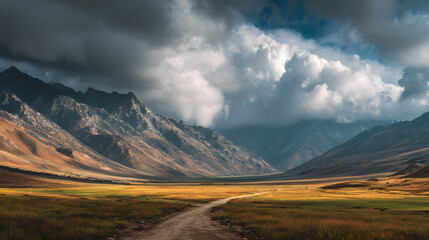 Dramatic Mountain Valley Landscape with Winding Road and Storm Clouds