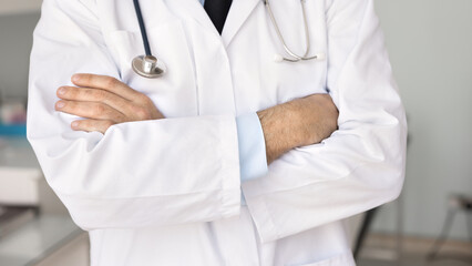 Trusted healthcare professional. Cropped close up confident male doctor in white coat stethoscope...