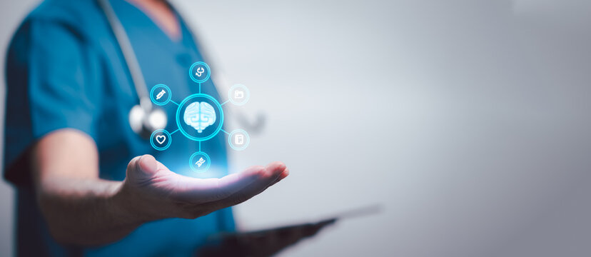 Medical doctor holding holographic brain interface with healthcare icons. Concept of AI in neurology, digital health data management, innovative medical technology, and smart clinical diagnostics.