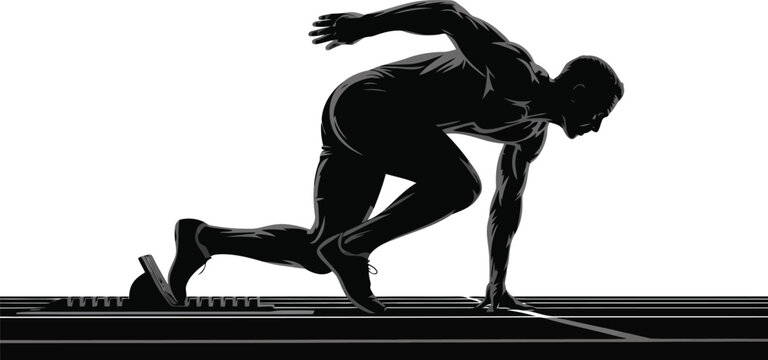 A determined male runner takes his mark at the starting block on a crisp track