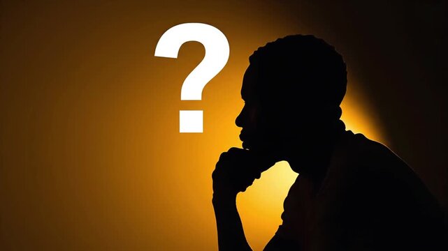 Man silhouette thinking with question mark above head.