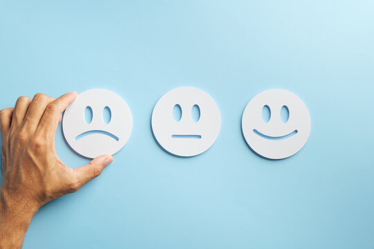 Review illustrates customer negative feedback, hand picking poor unhappy face showing bad experience, satisfaction survey options for service business complaint management