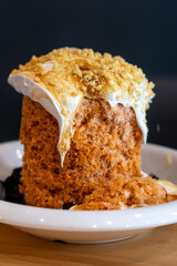 Thai tea bingsu served with grass jelly and whipped cream