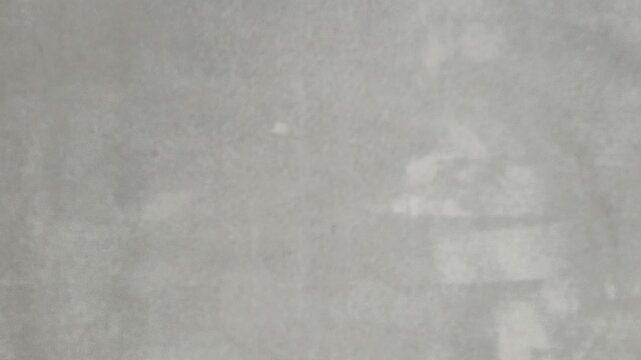 Hand giving or offering bunch of kuwaiti dinar (kwd) kuwait currency note money to another hand. Middle East business, finance, spend, pay, savings, banking and commerce concept. Extreme closeup view.