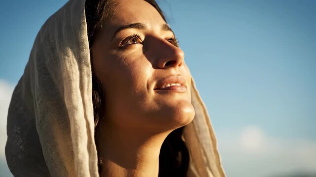 Woman gazing upward slowly lifts head, her serene expression reflects spiritual contemplation as woman gazing upward finds peace. This inspiring woman gazing upward footage captures hope and devotion.