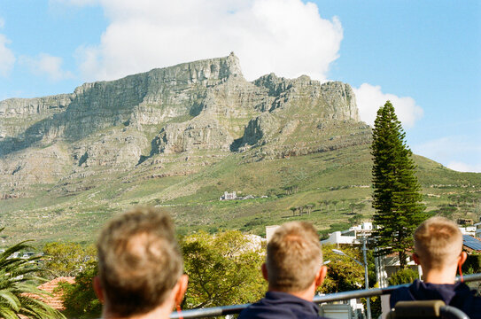 Riders view Table Mountain during a sunny day in Cape Town