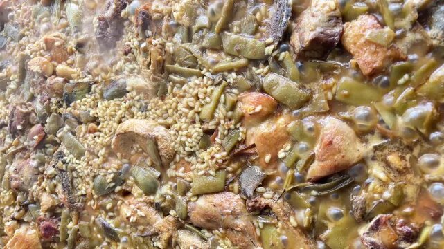 A plate of food with a lot of green vegetables and meat. The food looks delicious and healthy