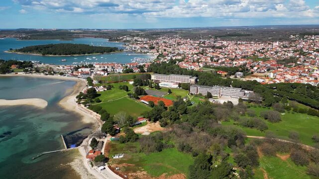 Aerial drone view of beautiful Medulin city in Istria, Croatia. Amazing sea side photo of tourist attraction Medulin near Pula, Croatia