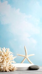 Summer still life. A white starfish stands on a round platform. Coral & smooth pebble on a textured surface