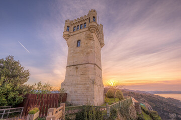 Torreon del Monte Igueldo Tower at Sunset, Historic Stone Lighthouse Tower in San Sebastian, Donostia, Spain