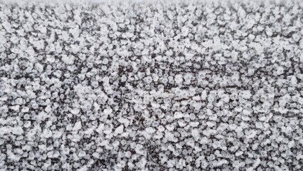 Snow covers the ground creating a white blanket on a winter day