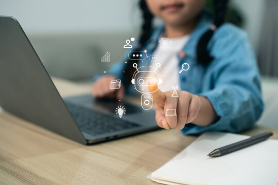 Young girl interacting with AI chatbot icon on laptop. Child using artificial intelligence for smart learning, digital communication, and future technology education at home.