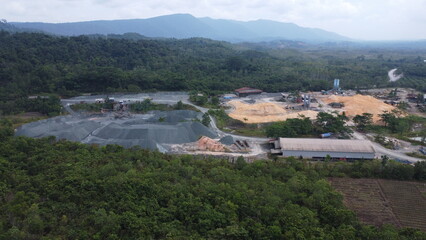 Obraz premium Concrete and asphalt manufacturing plant, piles of fine stone and sand