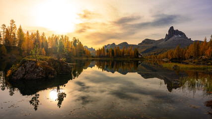 The photo specular landscape of lake Dedera at dolomite in Italy