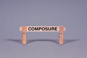 Fototapeta premium Composure symbol. Single Wooden stick restrained by Clothespins, beautiful Gray Background. Business and Composure concept with copy space
