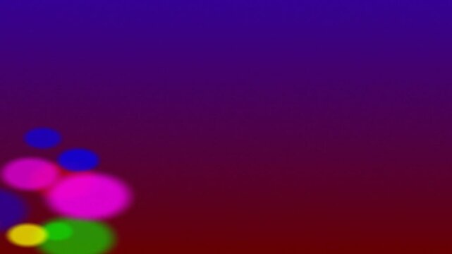 moving colorful orbs drifting in blurred gradient background