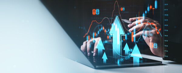 Financial market growth concept with digital stock chart and upward arrows overlaying businessman using laptop on modern background.
