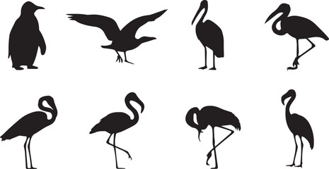 A striking black silhouette of a flamingo standing in profile view