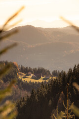 Minimal mountain landscape with mist and pastel sky