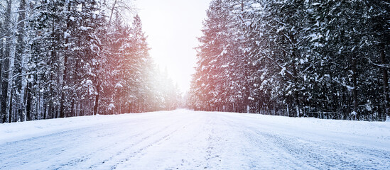 Beautiful snowy country road in winter