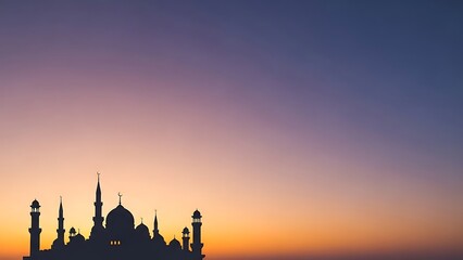 Obraz premium Mosque Silhouette at Sunset during Ramadan with Copy Space