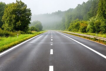 Mysterious Highway Disappearing into Dense Fog Ahead, Evoking a Sense of Adventure